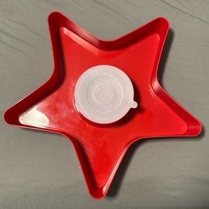 Red plastic star serving tray with center dip holder